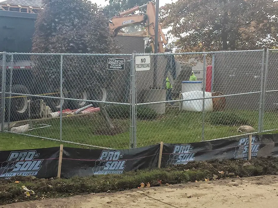 Temporary rental gate installed at a construction site entrance